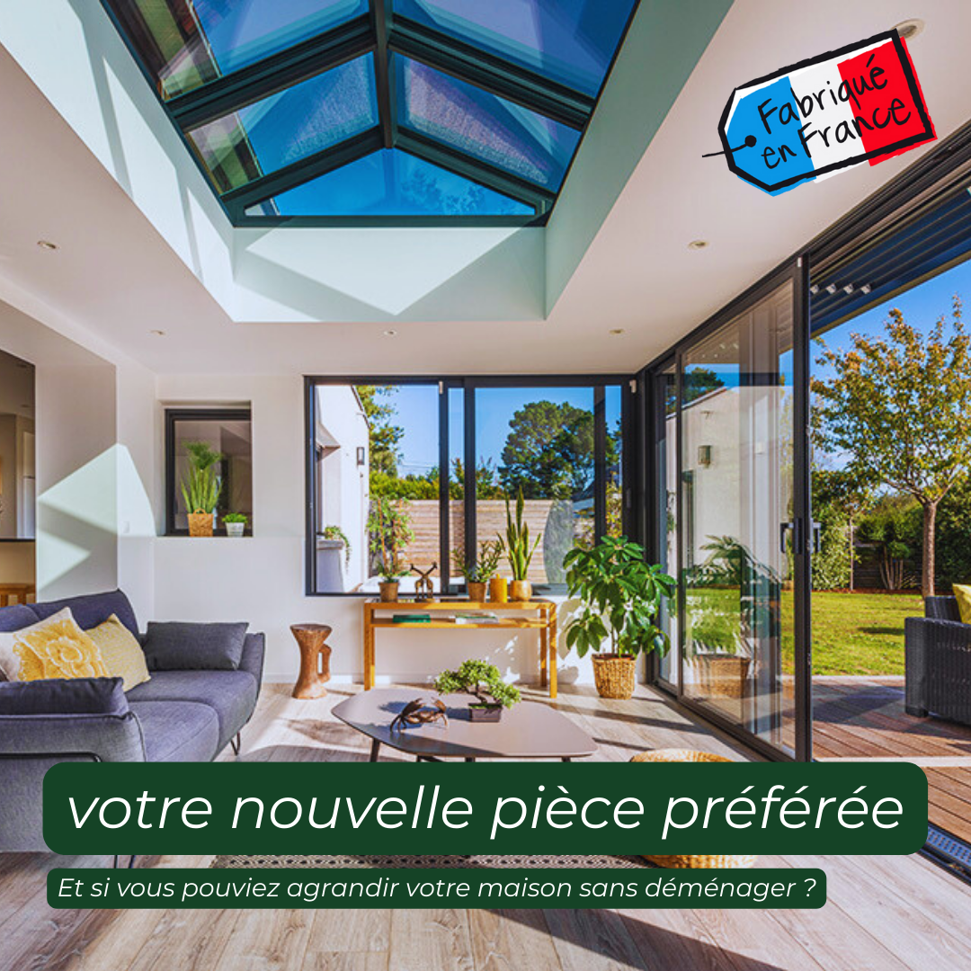 Extension de maison avec puit de lumiere et grandes baies vitrées pour laisser entrer la lumière